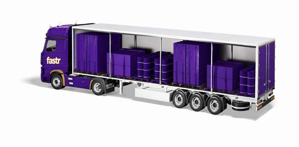 Lila LKW mit offener Ladefläche und Fracht